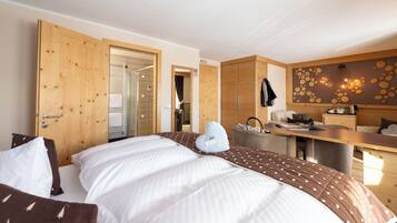 Ida Suite | Premium bedding, down comforters, memory foam beds, in-room safe
