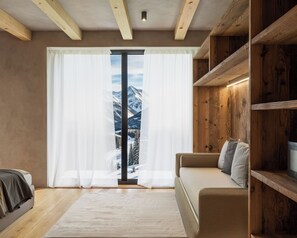 Superior Triple Room | Living area | 26-inch TV with satellite channels - Al Nin Hotel&Spa (Livigno)