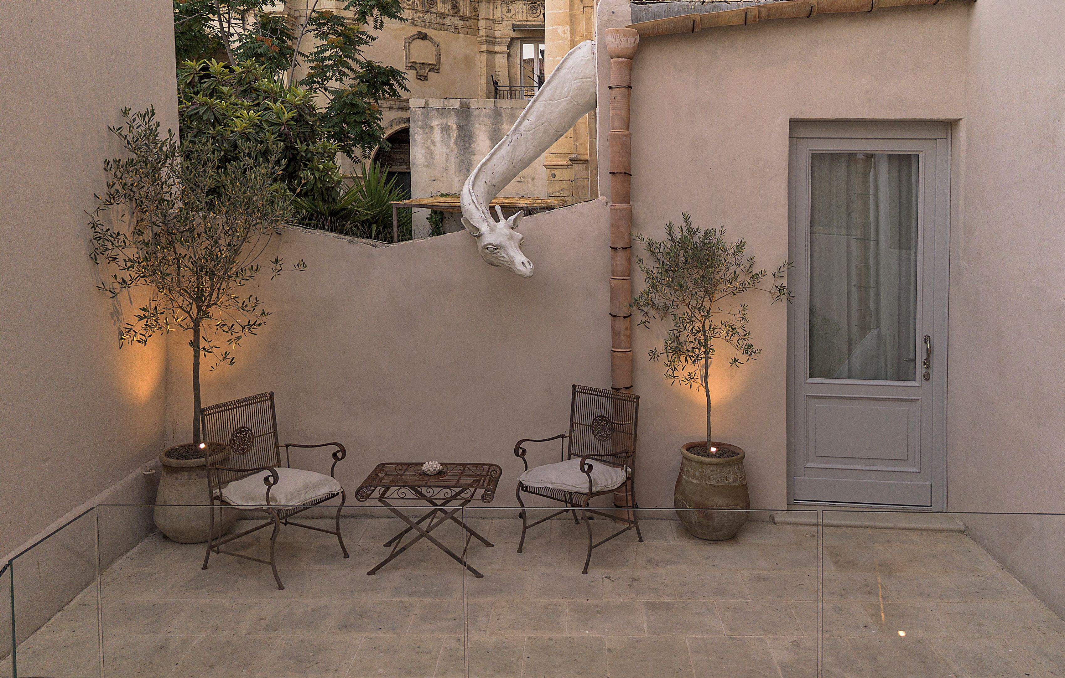 exclusive suite, pool view | terrace/patio