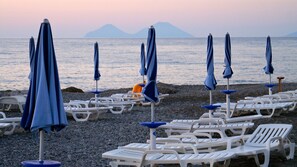 Private beach, sun-loungers, beach umbrellas, windsurfing