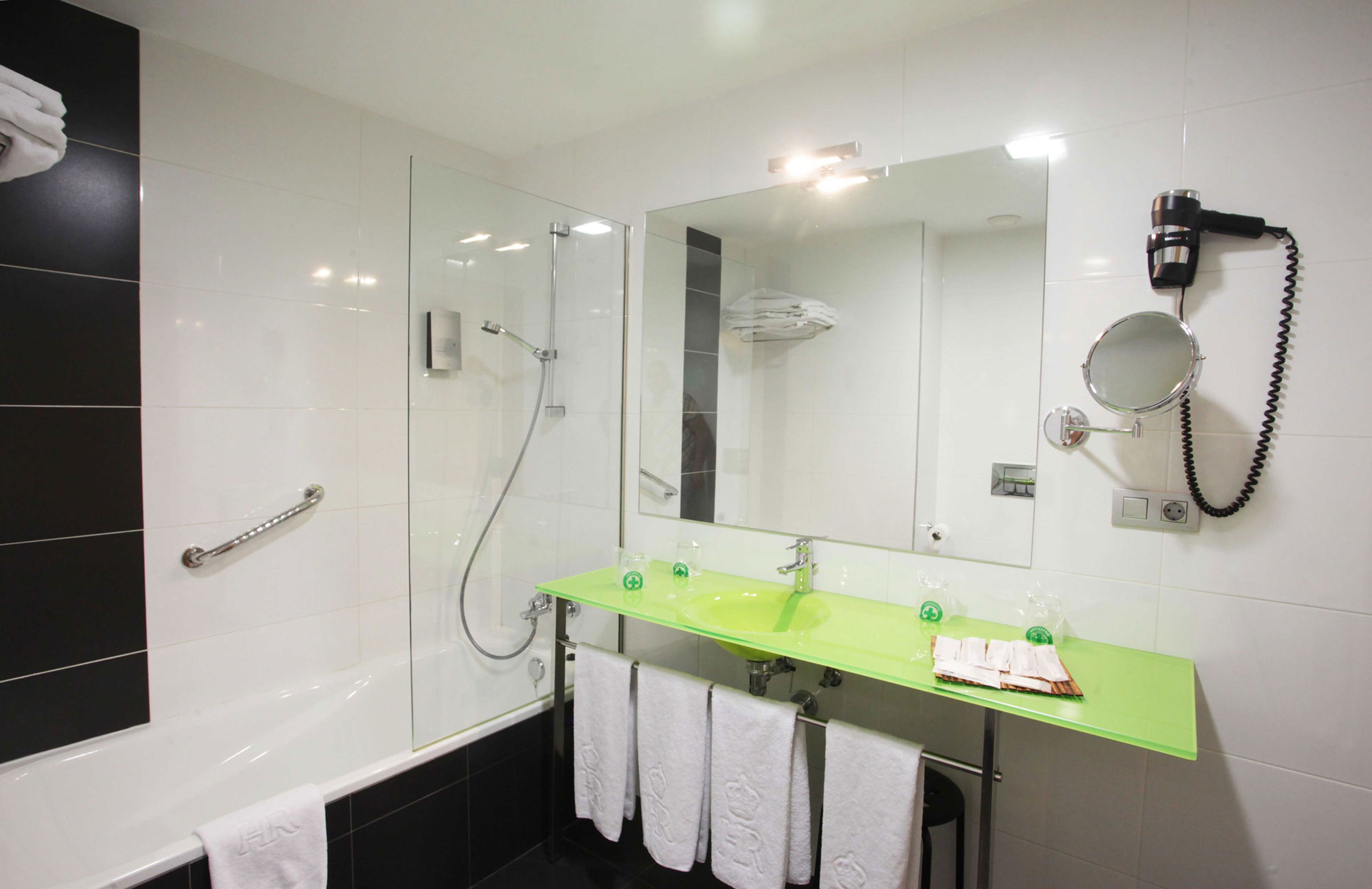 family room | bathroom | shower, free toiletries, hair dryer, towels