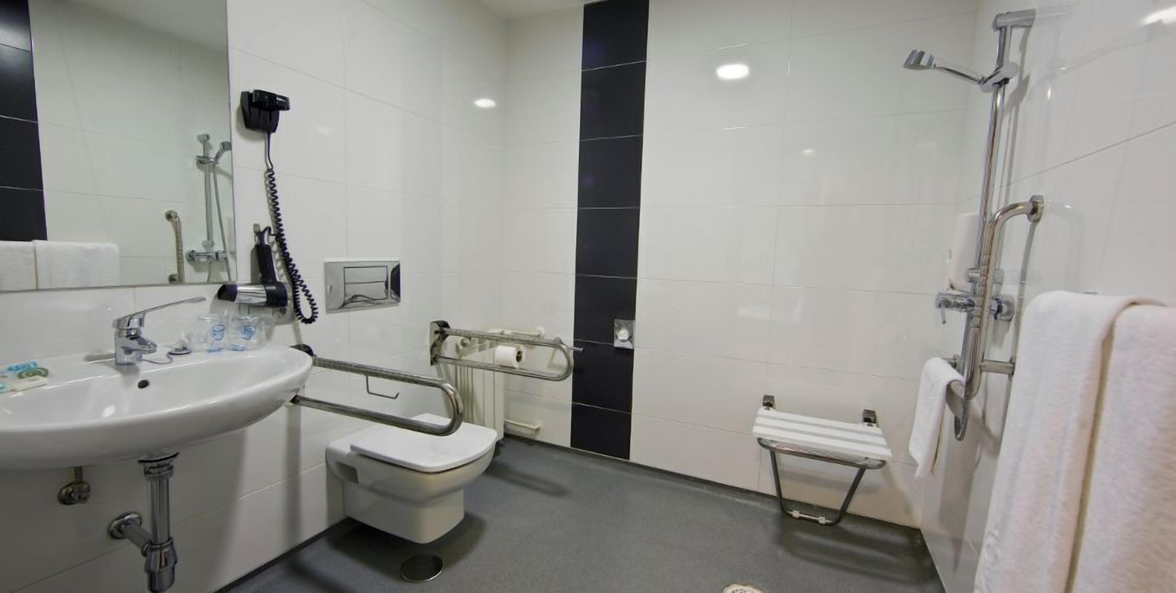 standard double room, 1 double or 2 single beds | bathroom | shower, free toiletries, hair dryer, towels