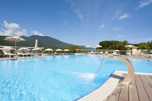 Outdoor pool, open 9:00 AM to 7:00 PM, pool umbrellas, pool loungers