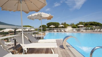 Outdoor pool, open 9:00 AM to 7:00 PM, pool umbrellas, pool loungers