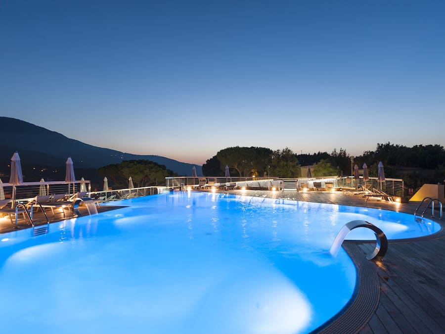 Outdoor pool, open 9:00 AM to 7:00 PM, pool umbrellas, pool loungers