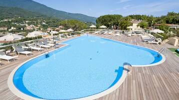 Outdoor pool, open 9:00 AM to 7:00 PM, pool umbrellas, sun loungers
