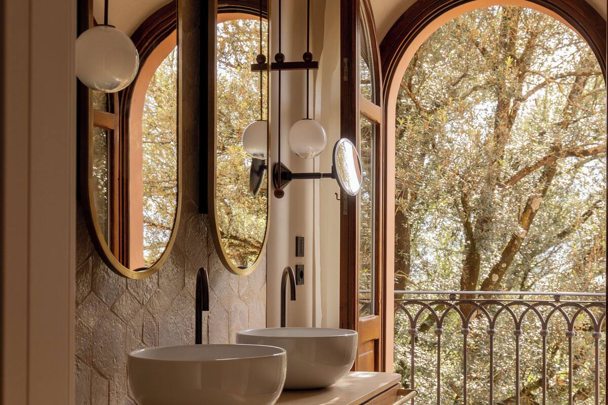 suite | bathroom | designer toiletries, hair dryer, bathrobes, slippers