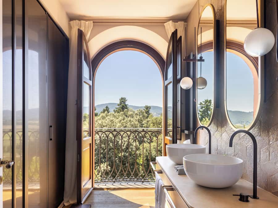 Designer toiletries, hair dryer, bathrobes, slippers