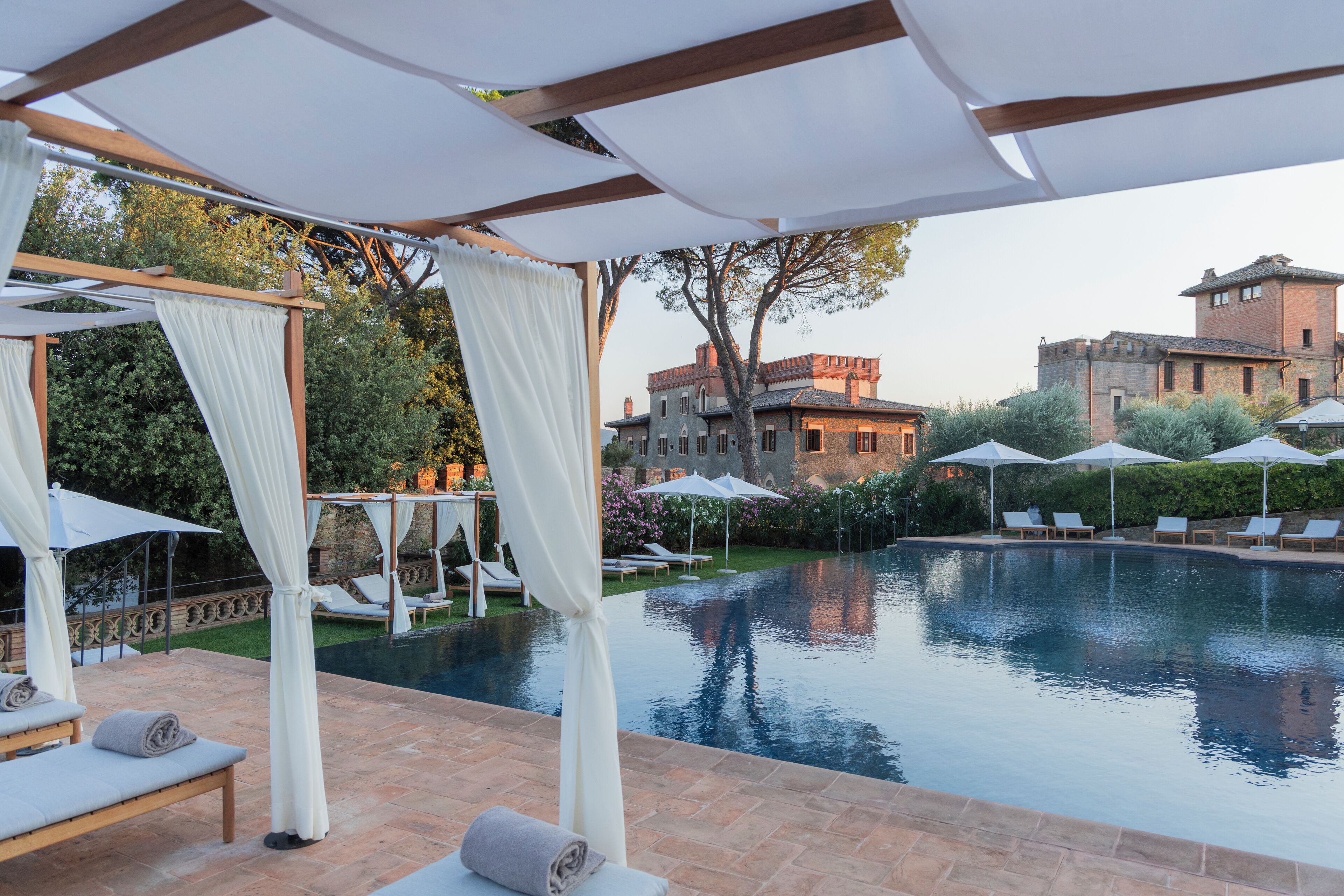 seasonal outdoor pool, pool umbrellas, pool loungers