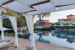 Seasonal outdoor pool, pool umbrellas, pool loungers