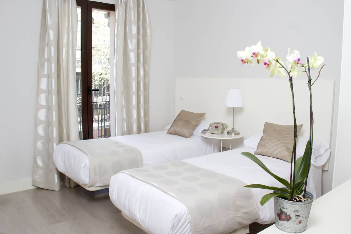 Double Room | Blackout drapes, iron/ironing board (on request), WiFi (free)