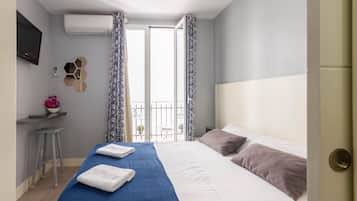 Blackout drapes, iron/ironing board, free WiFi, bed sheets