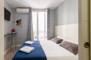 Blackout drapes, iron/ironing board, free WiFi, bed sheets