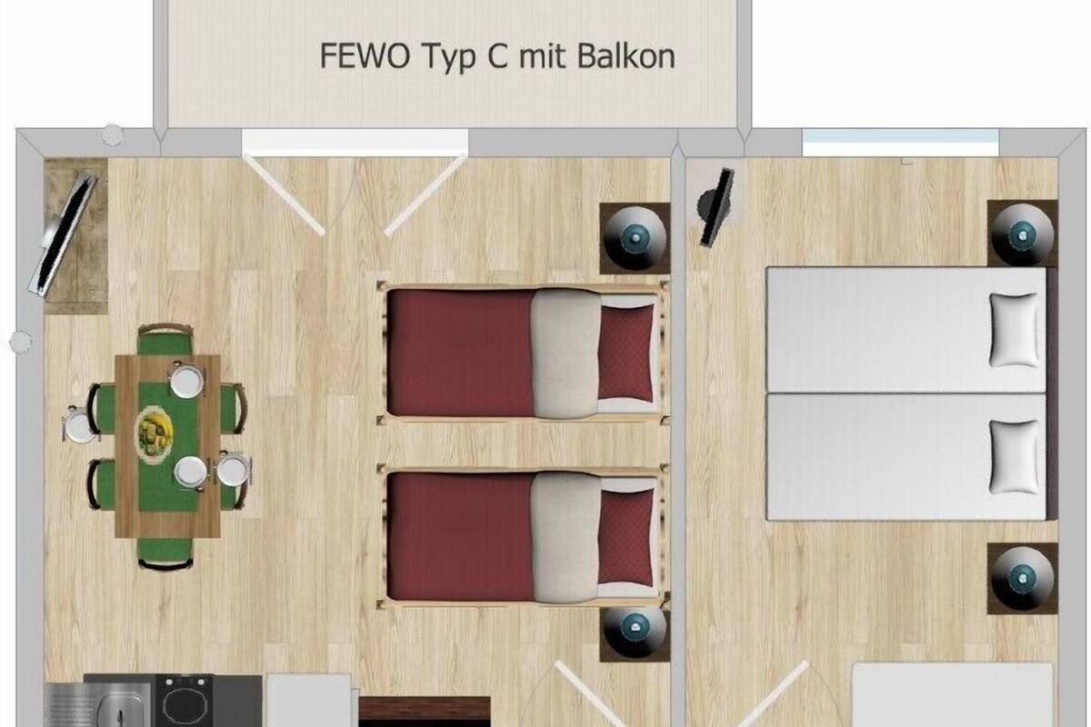 Grundriss einer FEWO Typ C Wohnung mit Balkon, inklusive Essbereich, zwei Schlafzimmern, einem Badezimmer und einer Küche.
