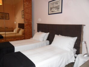 Chambre Confort double ou avec lits jumeaux, 1 chambre, vue sur le jardin | Literie de qualité, couette en duvet, minibar, bureau