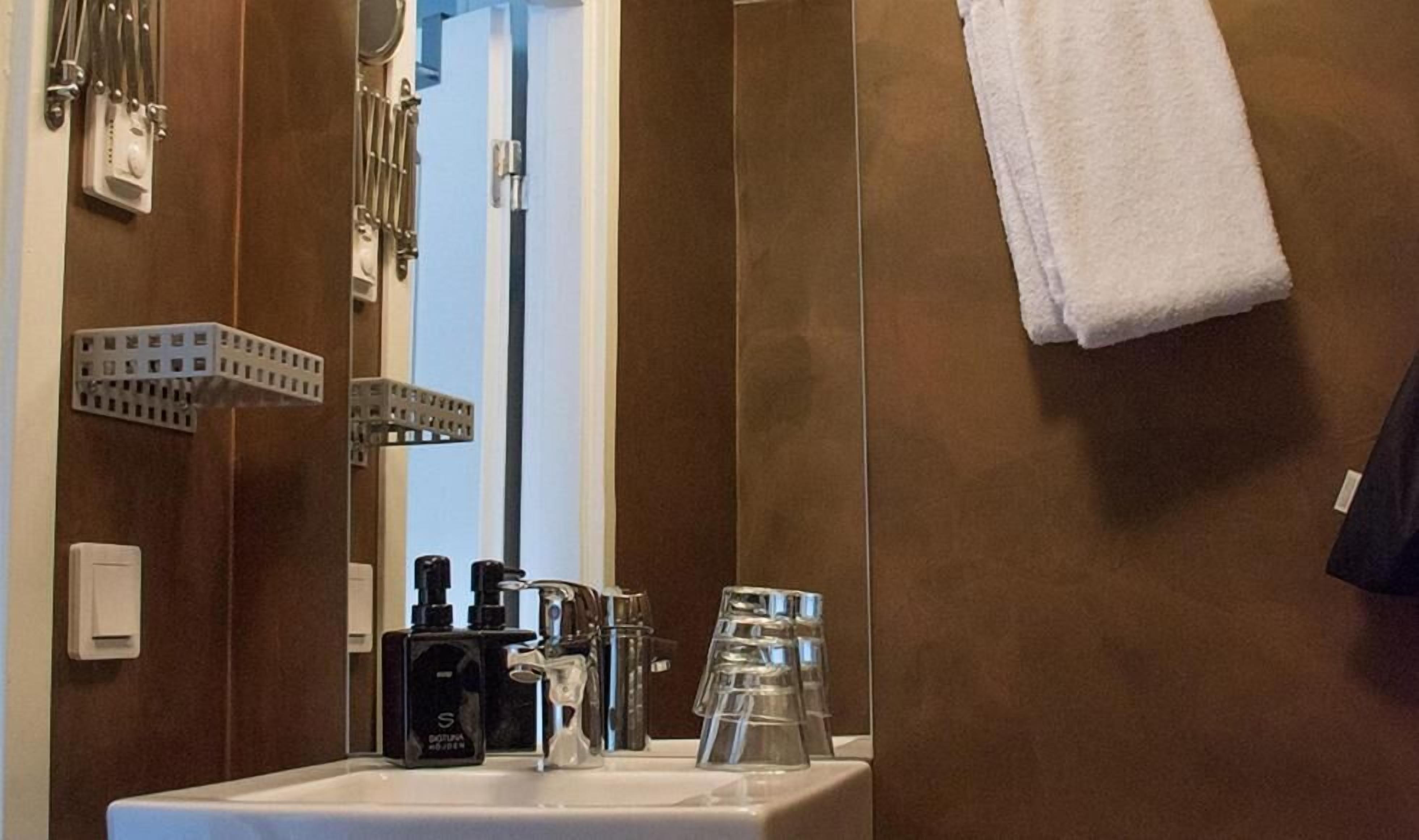 shower, hair dryer, bathrobes, towels