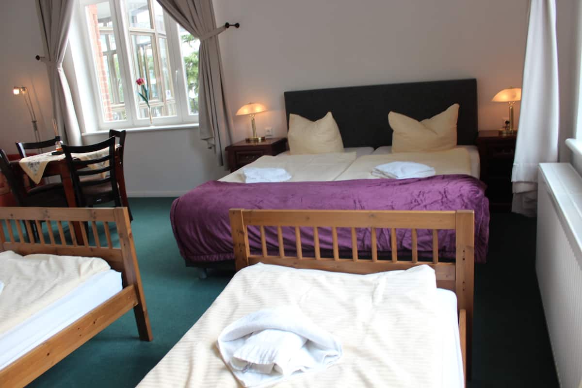 Basic Quadruple Room | Premium bedding, pillowtop beds, soundproofing