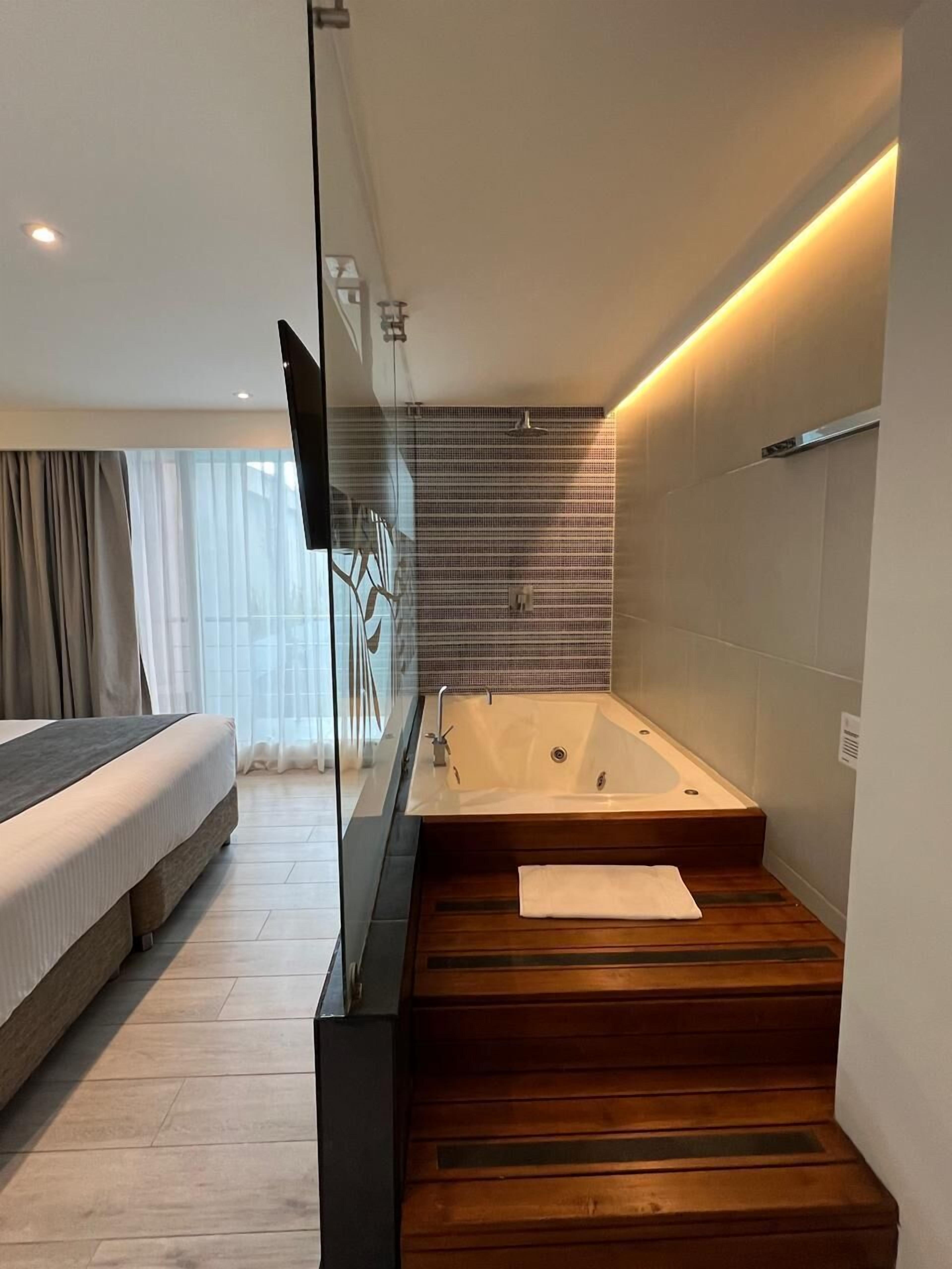 deluxe room | private spa tub