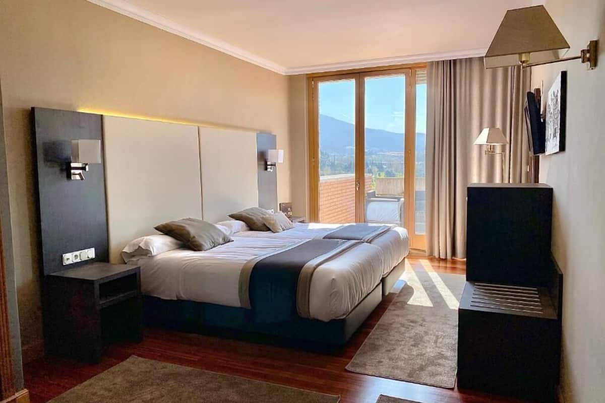 superior room | down duvets, memory-foam beds, minibar, in-room safe