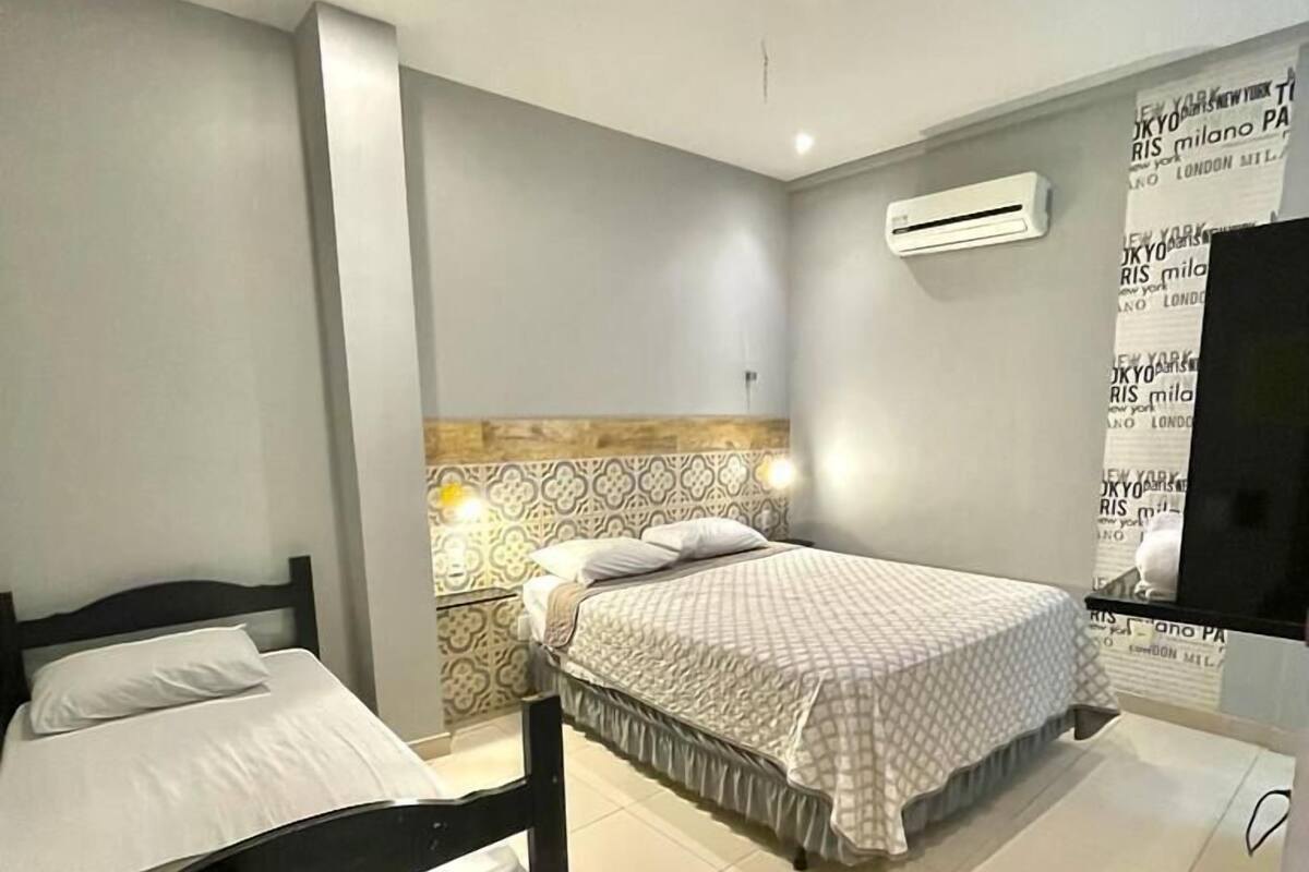 Standard Triple Room, 1 Bedroom | Minibar, free WiFi, bed sheets