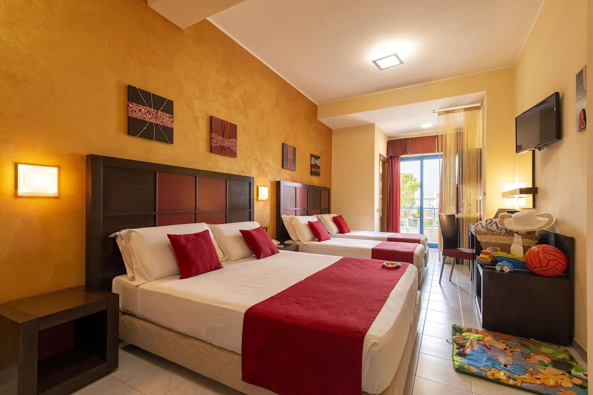 Familiekamer | Italiaanse Frette-lakens, luxe beddengoed, een minibar