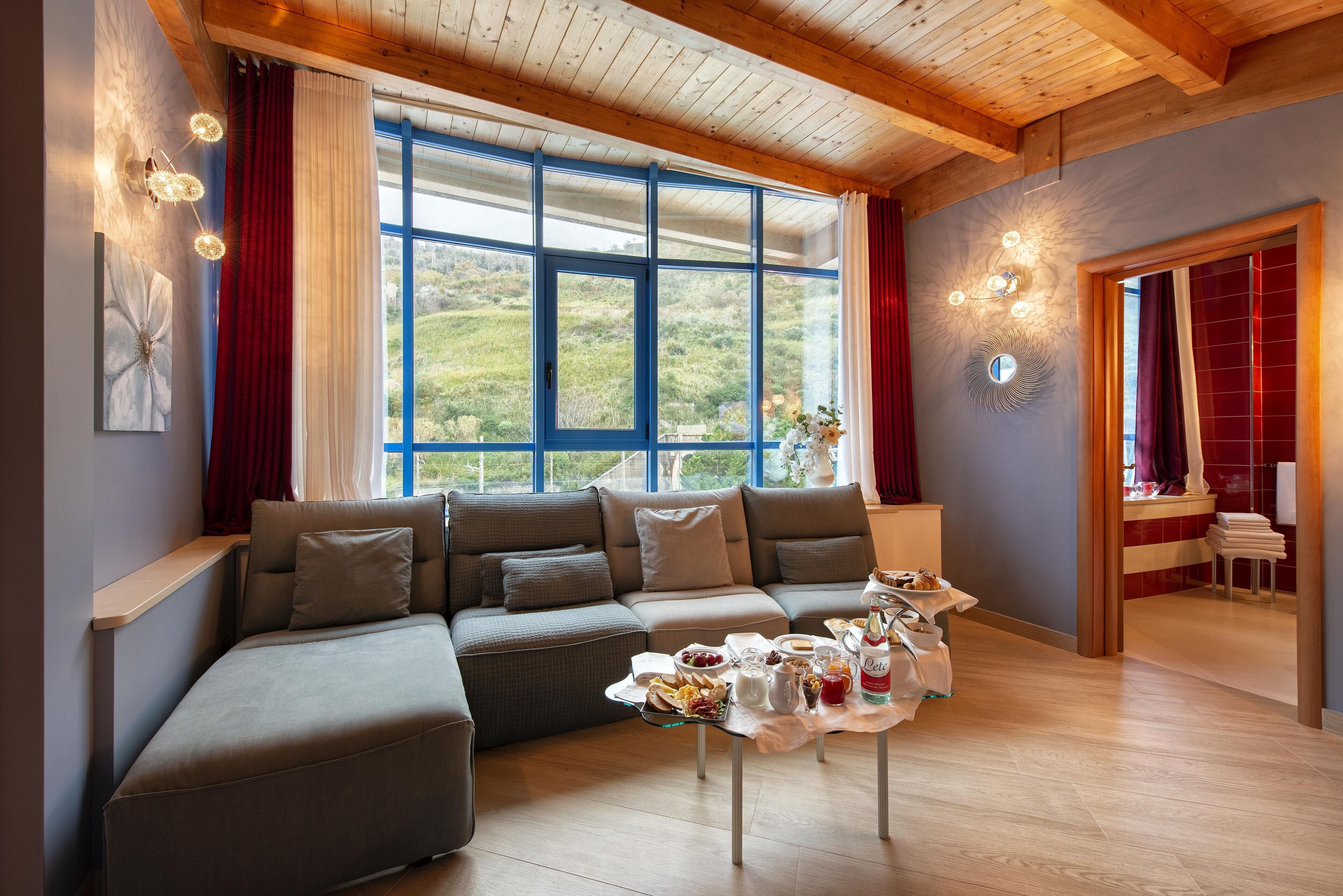 Romantic Suite | Living area | 32-inch flat-screen TV with digital channels, TV