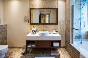 Combined shower/bathtub, free toiletries, hair dryer, bathrobes