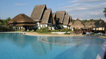 Outdoor pool, open 7:00 AM to 9:00 PM, free pool cabanas, pool loungers