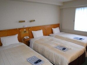 ห้องทริปเปิล, เตียงเดี่ยว 3 เตียง, ปลอดบุหรี่ | ผ้านวมขนเป็ด, โต๊ะทำงาน, พื้นที่ทำงานแบบใช้แล็ปท็อป, ผ้าม่านกันแสง