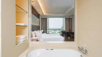 Combined shower/tub, free toiletries, hair dryer, bathrobes
