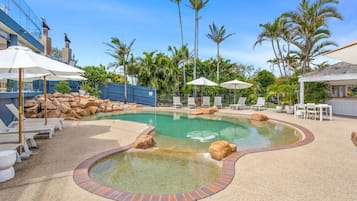 Outdoor pool, free pool cabanas, pool umbrellas