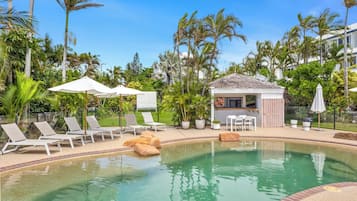 Outdoor pool, free pool cabanas, pool umbrellas