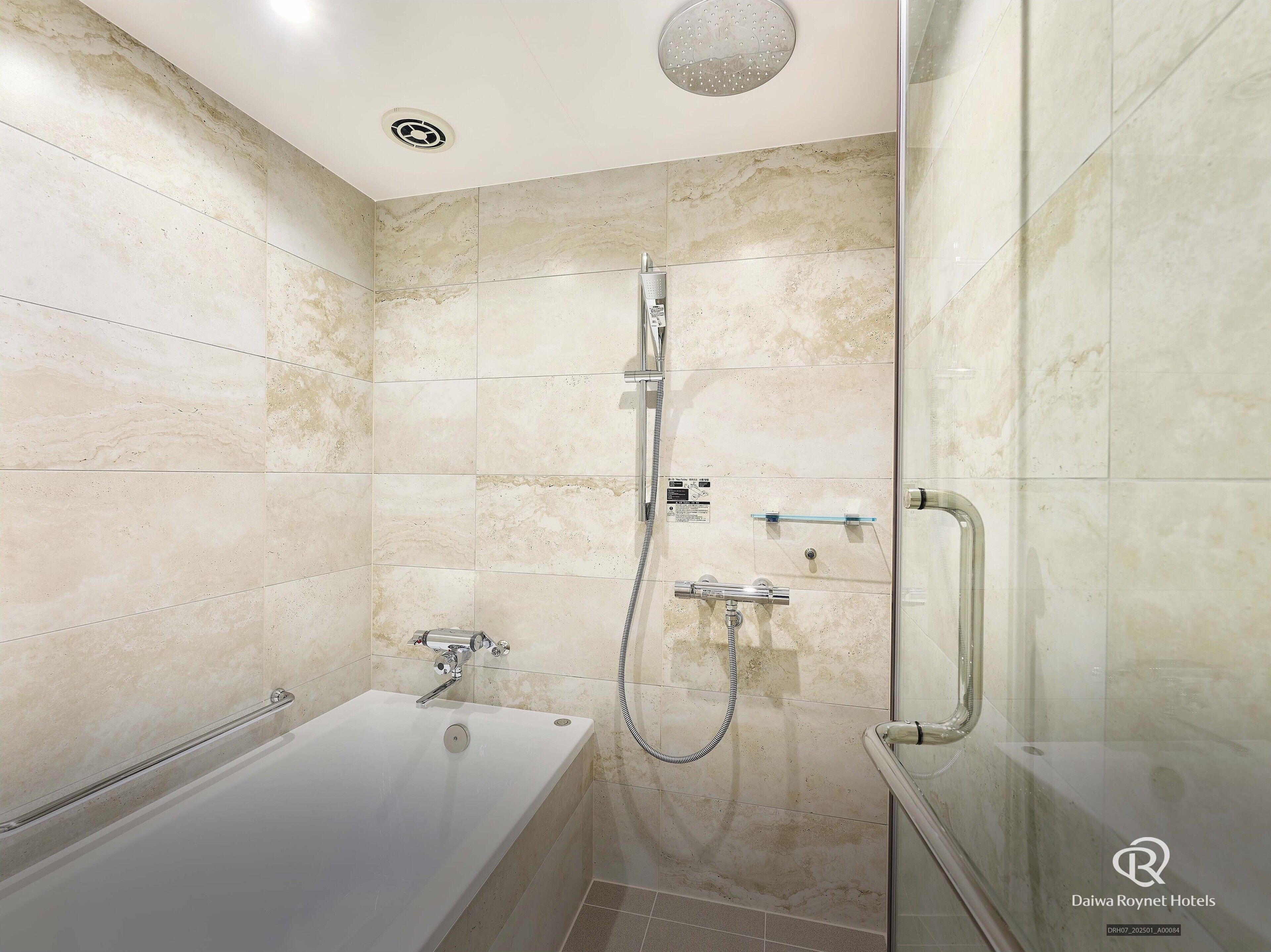 combined shower/bathtub, free toiletries, hair dryer, slippers