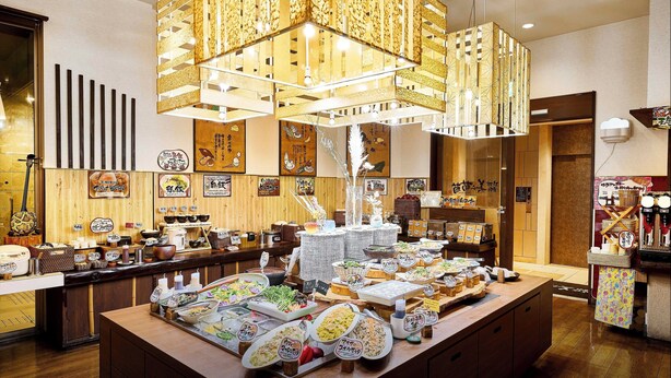 A buffet area with various dishes and a traditional Japanese interior. - Daiwa Roynet Hotel Naha - Kokusaidori (Naha)