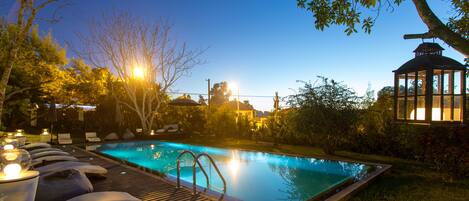 Outdoor pool, open 9:30 AM to 9:00 PM, pool umbrellas, sun loungers