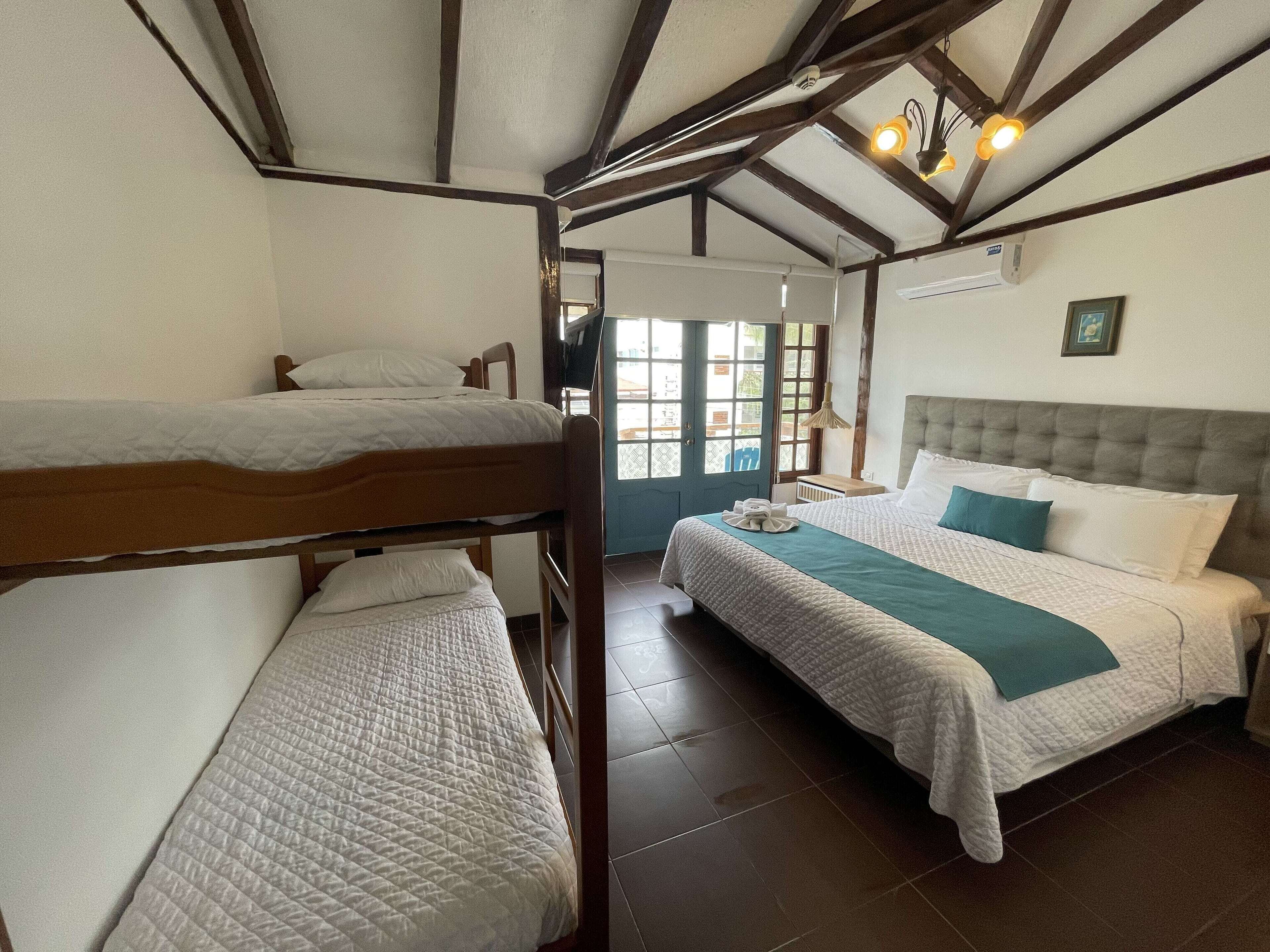 traditional triple room, balcony | down duvets, iron/ironing board, bed sheets