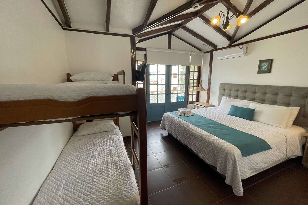 traditional triple room, balcony | down duvets, iron/ironing board, bed sheets