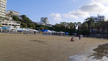 Enjoy leisure activities on this public beach with scenic views and a variety of structures.