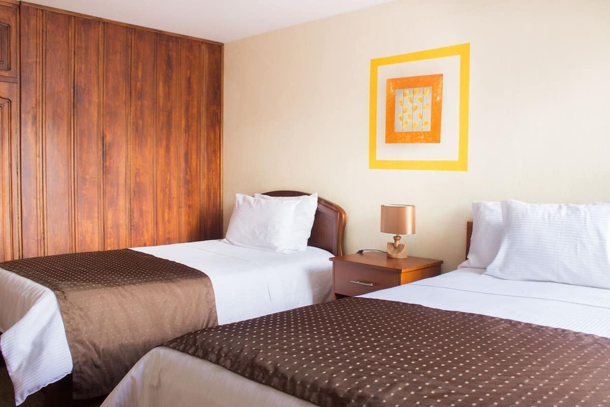 Twin Room | In-room safe, individually decorated, desk, iron/ironing board