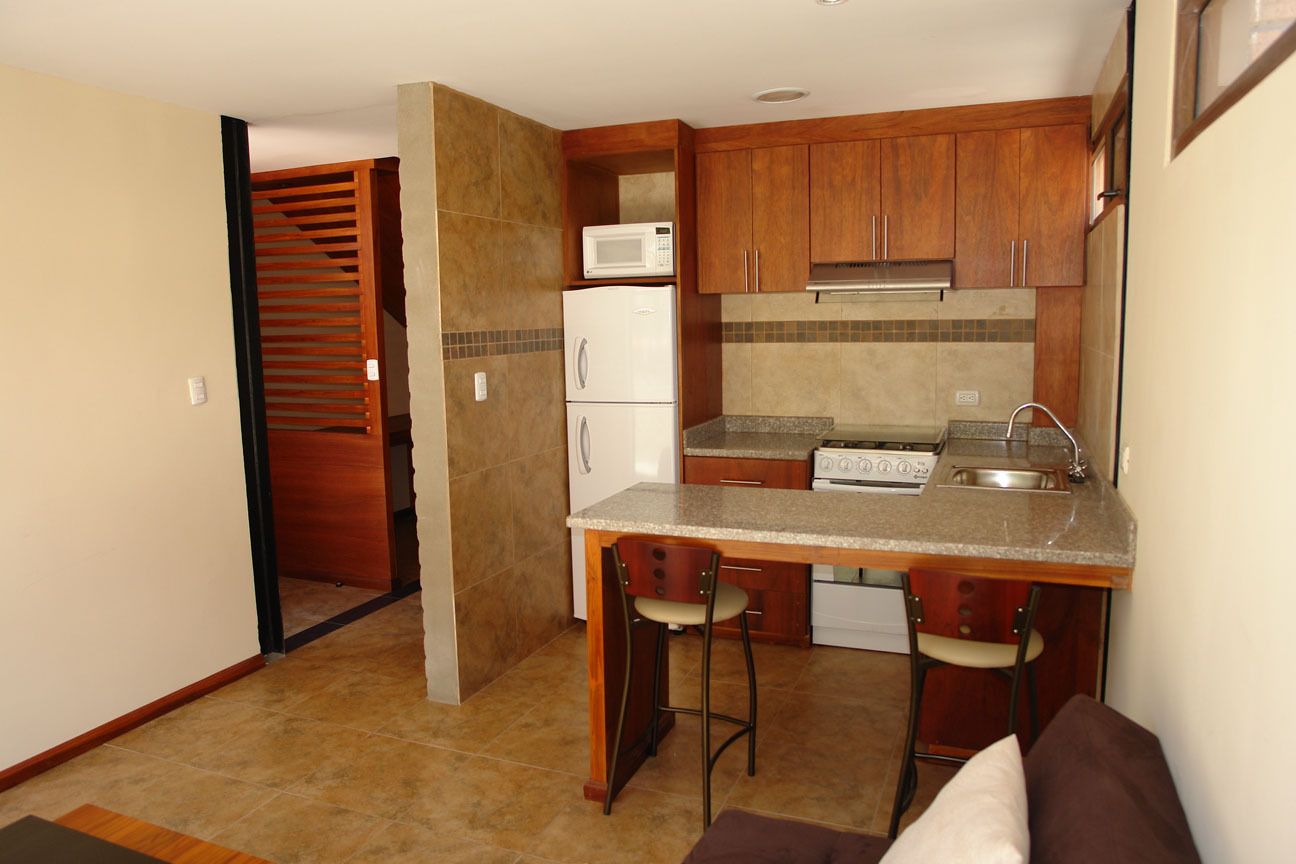 microwave, coffee/tea maker, cookware/dishes/utensils