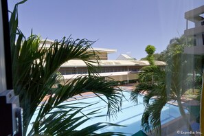 Deluxe Room, Pool View | View from room - Holiday Spa Hotel (Cebu City)