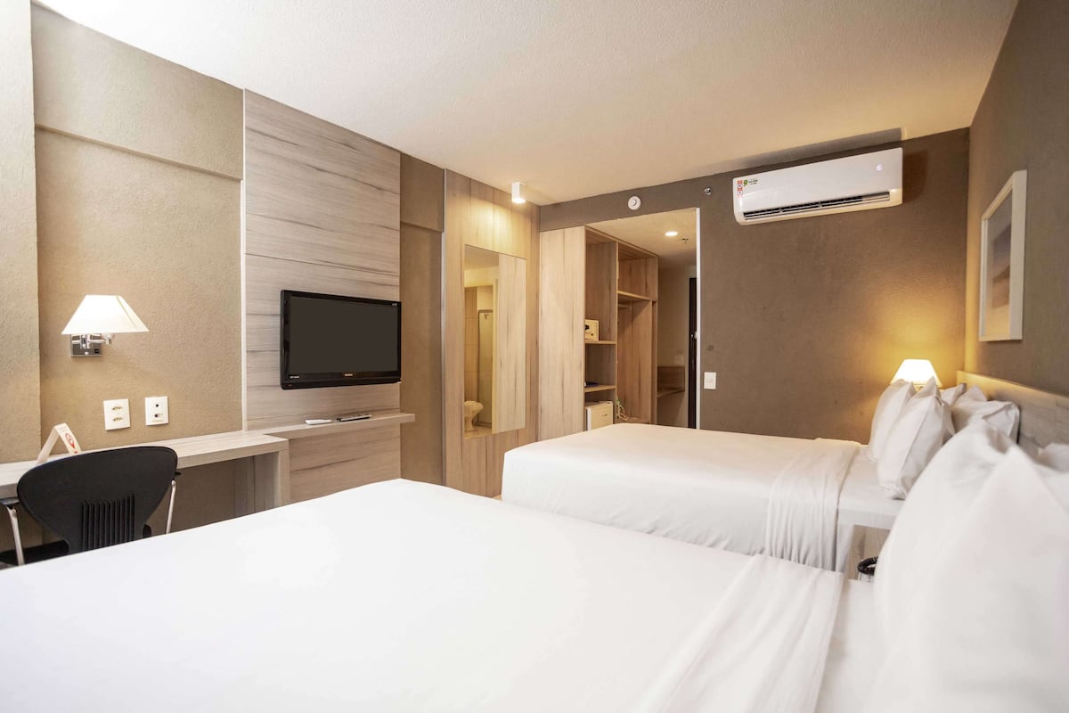 room, 2 queen beds | in-room safe, desk, iron/ironing board, free wifi