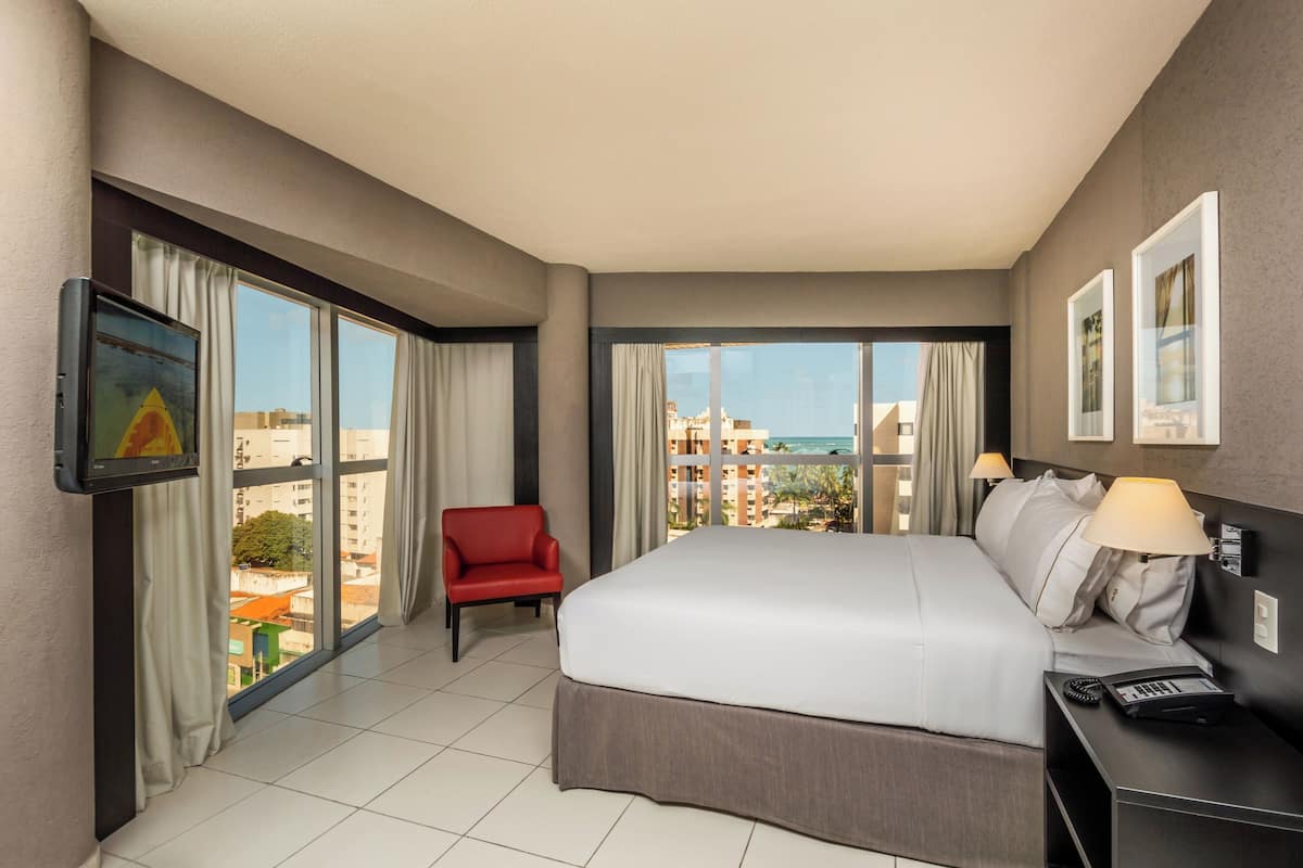 room, 1 king bed, bay view, corner | in-room safe, desk, iron/ironing board, free wifi