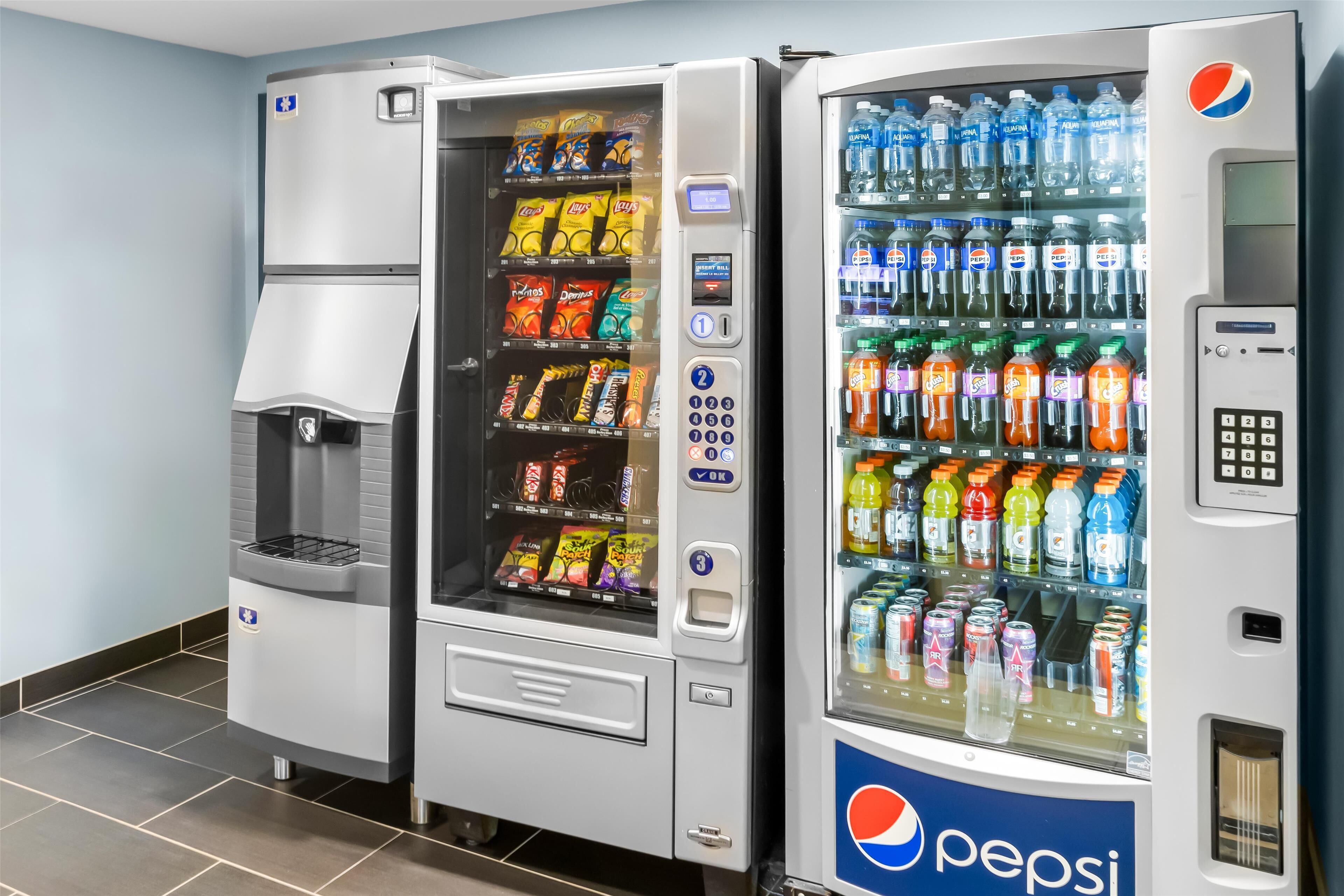 A vending machine with snacks and a Pepsi drink dispenser.