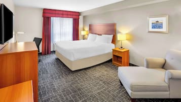 Suite, 1 King Bed, Non Smoking, Jetted Tub | Pillowtop beds, in-room safe, individually decorated