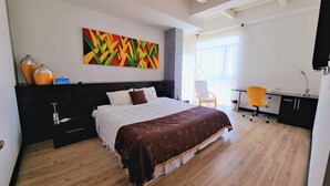 Junior Studio Suite | 1 bedroom, premium bedding, down comforters, minibar