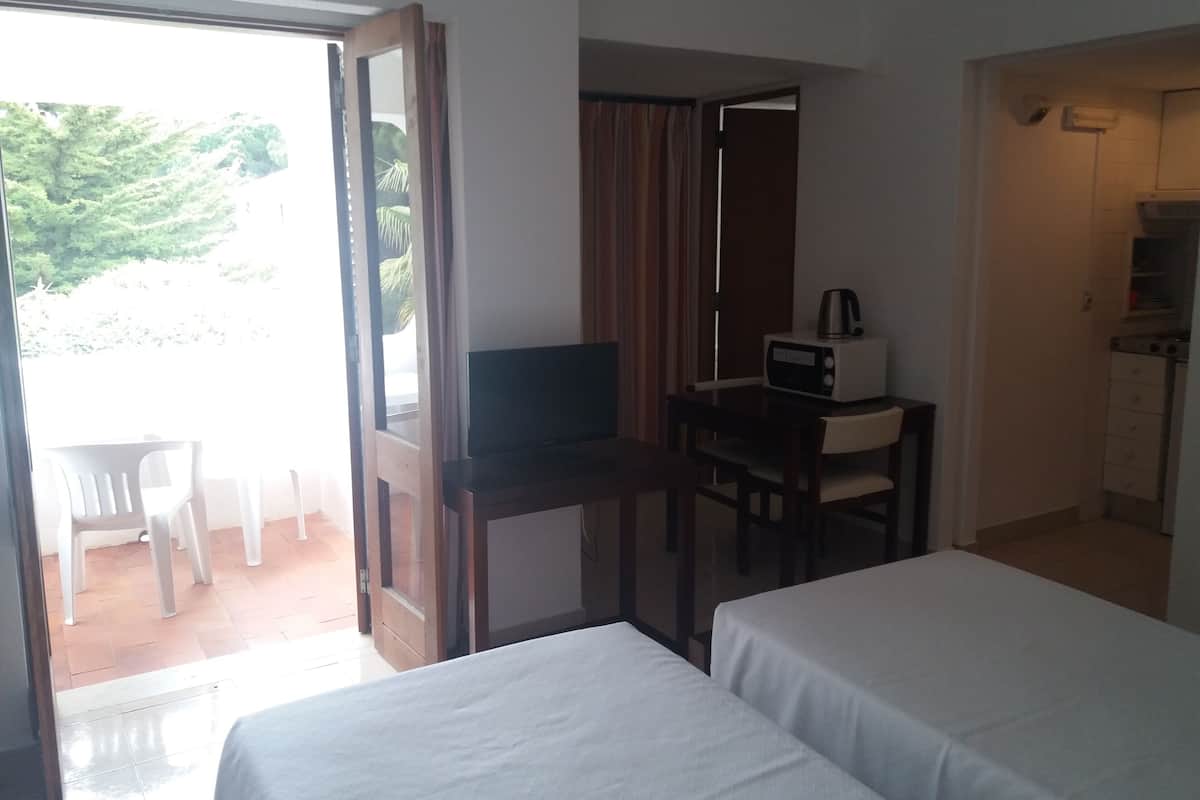 Pillow-top beds, blackout curtains, iron/ironing board, free WiFi