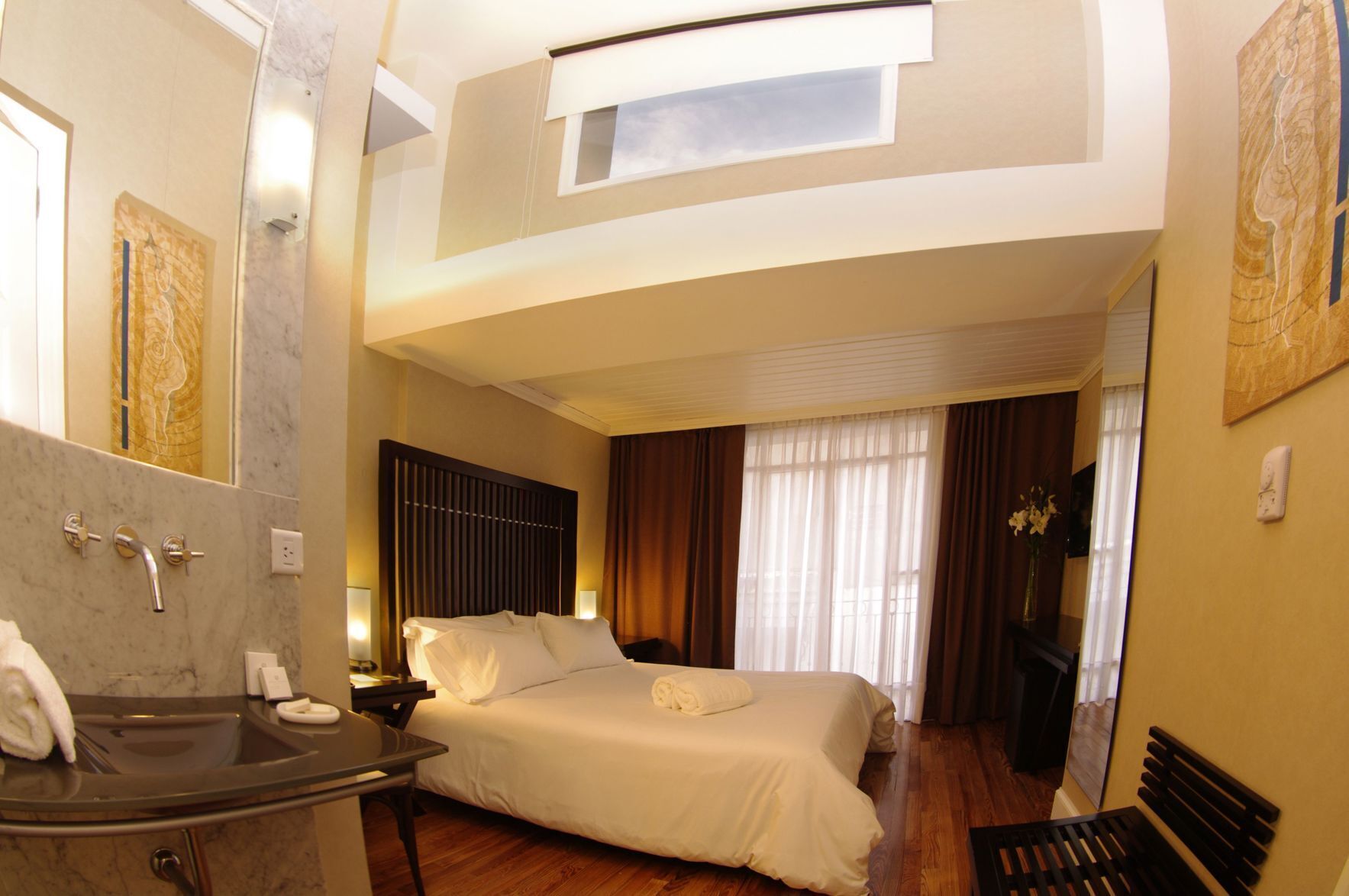 Premium bedding, down comforters, pillowtop beds, in-room safe