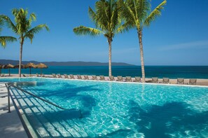 3 outdoor pools, pool umbrellas - Dreams Vallarta Bay Resort & Spa - All Inclusive (Puerto Vallarta)