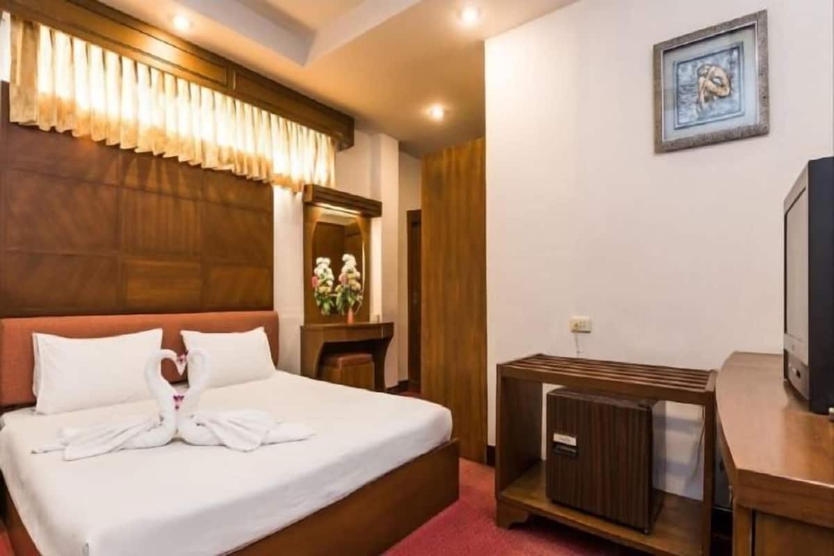 Camas Select Comfort, minibar y escritorio